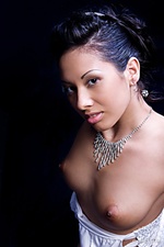 In white with her exotic looks, delightfully brown complexion, curvy body and amazingly slender limbs, tasha is an erotic charmer no man can ever resist.