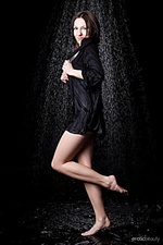 Against black shirley confidently prances around her gorgeous physique, wet and naked, enjoying all the attention to herself.
