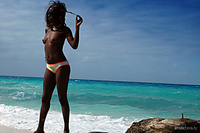 White sand 1 with beautiful tits and a dark chocolate pussy, maria l stuns at the beach near blue water.