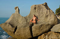 On the rocks 1 sarka flaunts her naked body and poses playfully on rugged rocks and desolate beach on her background.