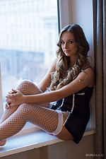 View from a room 1 amy moore showcases her stunning body and delectably pussy by the window.