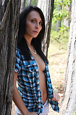 Presenting juliee pretty debutante juliee turns a simple walk in the woods into a daring striptease escapade that is daring and delightful.