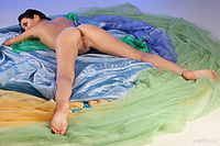 With color 2 olka faunts her slender body and small tits in a studio shoot then spreads her legs wide open baring her yummy pussy.