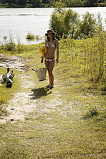 Presenting elela 1 newcomer elela strips her bikini, baring her slender body with beautiful puffy breasts as she poses by sandy shore.