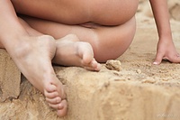 The beach lover chiara m flaunts her luscious body with beautiful breasts as she playfully  poses on the sandy beach.