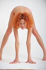 Simplicity 3 natalie red flaunts her slender, naked body with small puffy breasts and sweet pussy as she poses in front of the camera.