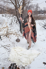 Presenting selin selin playfully poses in the snow as she displays her sweet pussy.