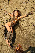 Having fun firebird a bares her gorgeous physique as she playfully poses outdoors.