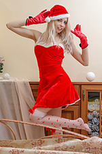 Red christmas egida strips her sexy, santa dress baring her tight body.
