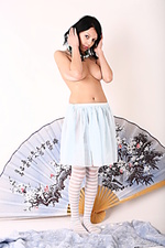 Presenting denara denara displays her smooth pussy as she bares her sexy skirt.