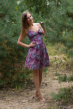 Naked in nature lenta delightfully poses in the forest as he bares her slender, naked body.