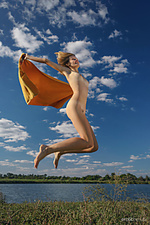 Flying high mak playfully poses by the lake as she flaunts her nubile body.