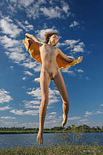 Flying high mak playfully poses by the lake as she flaunts her nubile body.