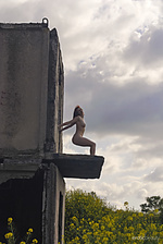 Presenting elis b redhead elis b displays her delectable body as she poses outdoors.