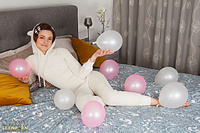 Beauty posing on her bed