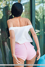 Alecto alecto displays her slender, tight body as she sensually poses by the veranda.