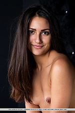 Cira nerri with a teasing smile on her pretty face, cira nerri slowly reveals her naked body and tempting assets