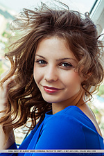 Emma sweet emma sweet sensually poses by the window as she spreads her legs wide open baring her   yummy pussy.