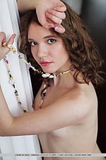 Carrie new model carrie bares her slender, nubile body with pink nipples by the window.