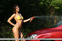 Galina a galina a shows off her wet, sexy bod as she washes the car.