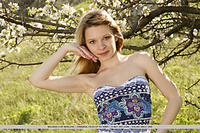 Malinda a malinda a delightfully poses outdoors baring her amazing physique.