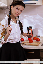 Iva iva spreads her legs on the chair baring her hairy pussy.