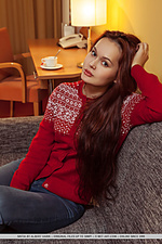 Sintia seductive brunette sintia starts taking off her clothes on top of the couch
