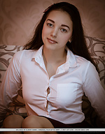 Solange solange bares her sweet ass and smooth pussy on the bed.