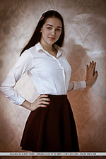 Solange solange bares her sweet ass and smooth pussy on the bed.