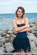 Yelena yelena shows off her big tits as she strips by the rocky beach. Yelena yelena shows off her big tits as she strips by the rocky beach.