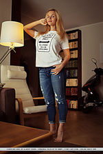 Caroline abel caroline abel shows off her big tits and curvy body as she strips on the couch.