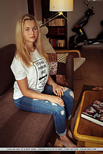 Caroline abel caroline abel shows off her big tits and curvy body as she strips on the couch.