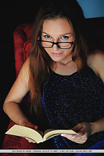 Sofi shane nerdy sofi shane flaunts her hairy snatch while reading on the chair.