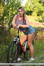 Eva jude eva jude shows off her sexy, slender body as she rides her bike.