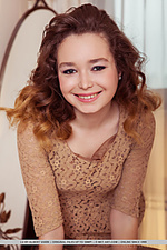 Lu lu strips on the bed as she bares her nubile body and meaty pussy.