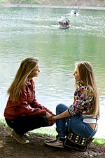 Not alone two luscious and uninhibited young women named liv and alexandra playfully poses in front of rylskys camera.