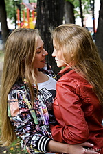 Not alone two luscious and uninhibited young women named liv and alexandra playfully poses in front of rylskys camera.