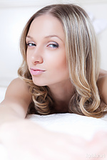 Neige augusta performs a slow and sensual striptease of her nightwear and stares seductively in front of the camera.
