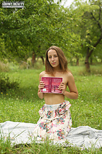 Naked teen on a picnic