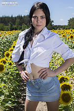 Nude girl in sunflowers