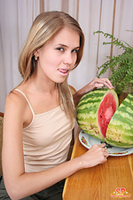 Cheeky teen with watermelon