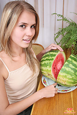 Cheeky teen with watermelon