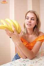 Breathtaking girl with bananas