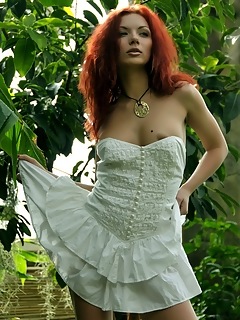 Tropic nude a redhead nymph slowly strips off her dainty dress, revealing a smooth fair complexion and gorgeous physique that stands out from the lush Tropic nude a redhead nymph slowly strips off her dainty dress, revealing a smooth fair complexion and gorgeous physique that stands out from the lush