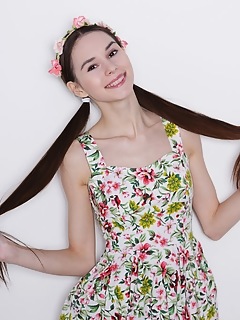 Brunette cutie goes naked