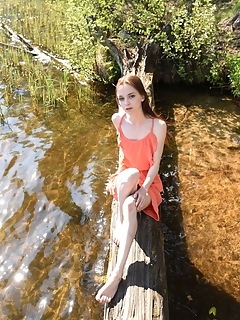 My swimming hole pala strips by the river as she displays her petite body.