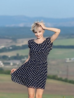 Horny and incredibly sexy blonde model with a perfect body gets off her clothes while posing outdoors. Horny and incredibly sexy blonde model with a perfect body gets off her clothes while posing outdoors.