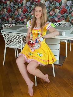 Imagine sexier then this cute teen angel posing on a chair and getting totally naked while playing with her tits.