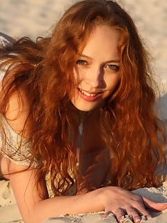 Beach petal fun and playful redhead with long and slender body.